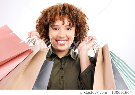 Fashion, portrait or happy black woman with shopping bag from boutique sale isolated on white background. Smile, face or excited female customer with retail deals on discount or offers in studio 130691664