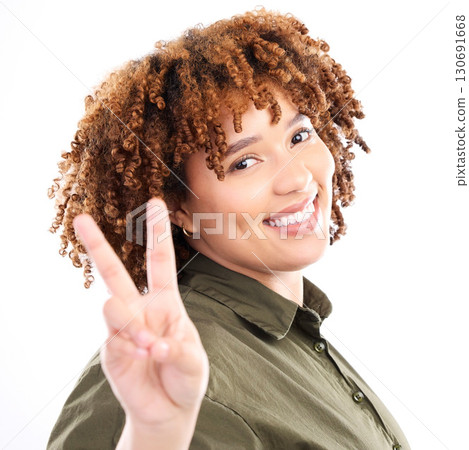 Peace, sign and portrait of black woman excited, confident and happy isolated against a studio white background. Young, fun and hand by casual female with a gesture feeling relax and happiness 130691668
