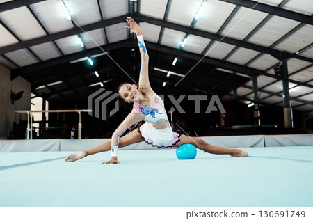 Portrait, gymnastics performance and woman exercise, training or workout in gym. Sports fitness, pro gymnast and happy female athlete or acrobat practice, exercising and performing for competition. 130691749