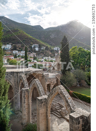 Bellapais Abbey ruins overlooking Bellapais village and Kyrenia mountains in Cyprus 130691753