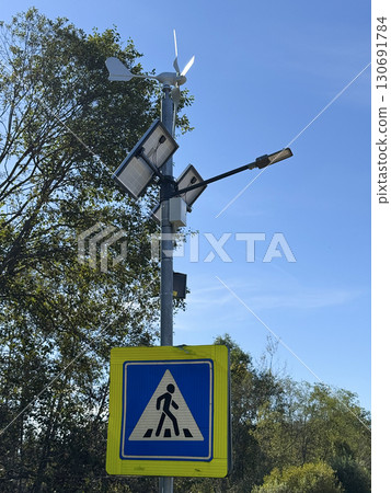 Environmentally conscious street lamps powered by renewable energy sources help cities reduce their carbon footprint and promote sustainable urban living. 130691784