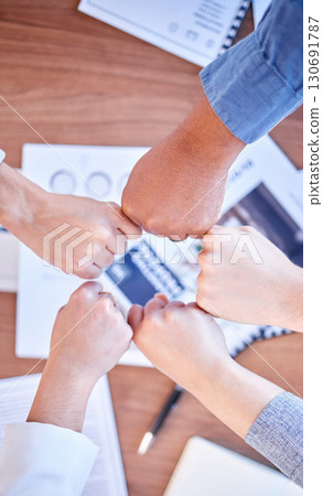 Fist bump, solidarity and above of business people hands for motivation, partnership and support. Meeting, teamwork and employees with fists for unity, collaboration and team building at a seminar 130691787