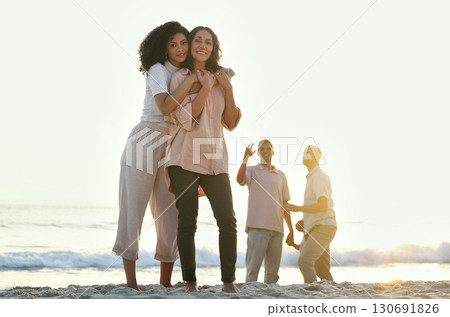 Embrace, portrait and mother and daughter at the beach for vacation, family walk and bonding. Sunset, love and elderly mom and woman hugging with affection while walking at ocean in summer for peace Embrace, portrait and mother and daughter at the beach for vacation, family walk and bonding. Sunset, love and elderly mom and woman hugging with affection while walking at ocean in summer for peace 130691826