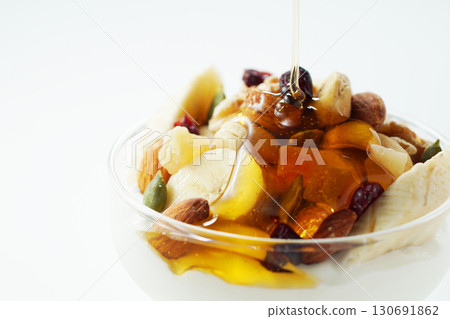 Greek yogurt with lots of ingredients and honey 130691862