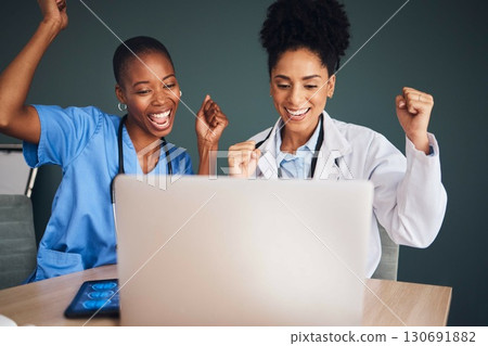 Laptop, black people or doctors in celebration of success for healthcare goals, achievement or hospital targets. Happy medical winners or nurses celebrating winning victory, good news or bonus deal 130691882