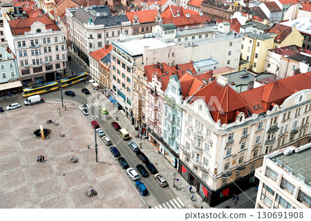 Yellow tram is crossing a Republic Square in a historical city center of Plzen (Pilsen). Czech Republic Yellow tram is crossing a Republic Square in a historical city center of Plzen (Pilsen). Czech Republic 130691908