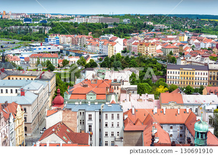 Panoramic view of a picturesque Plzen (Pilsen) city with red roofs and green trees on a sunny day, Czech Republic Panoramic view of a picturesque Plzen (Pilsen) city with red roofs and green trees on a sunny day, Czech Republic 130691910