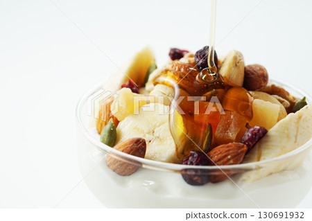 Greek yogurt with lots of ingredients and honey 130691932