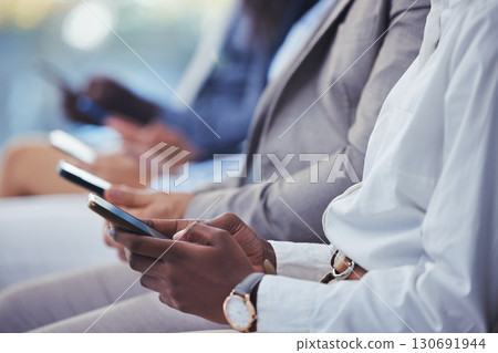 Hands, phone and human resources with a group of people waiting in line for an interview or meeting. Mobile, hiring and recruitment with business collegues sitting in an hr candidate shortlist row Hands, phone and human resources with a group of people waiting in line for an interview or meeting. Mobile, hiring and recruitment with business collegues sitting in an hr candidate shortlist row 130691944
