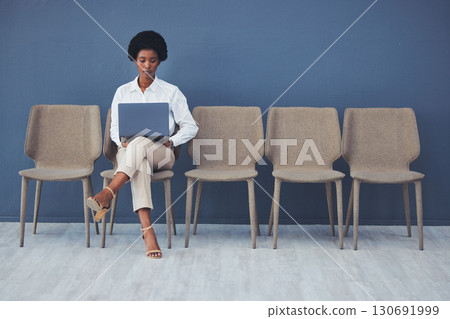 Black woman, laptop and focus for interview on chair with email, waiting and ready for job opportunity. Young african businesswoman, recruitment and mockup with computer for typing, research and goal Black woman, laptop and focus for interview on chair with email, waiting and ready for job opportunity. Young african businesswoman, recruitment and mockup with computer for typing, research and goal 130691999