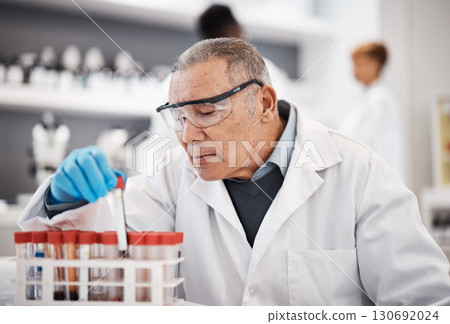 Blood, science and senior man in laboratory with sample for research, medical study and forensic investigation. Healthcare, pharmaceutical and scientist with vial for dna test, biology and rna exam 130692024