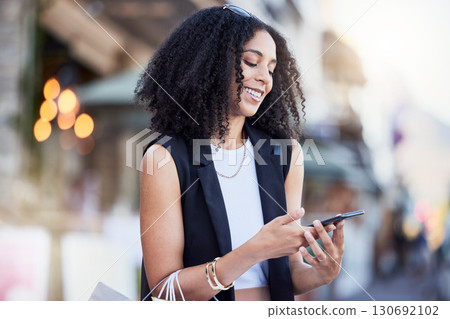 Black woman, smartphone and texting in city with shopping, online date and social network app for contact. Happy gen z girl, phone and internet communication with digital ux, chat and walk in street Black woman, smartphone and texting in city with shopping, online date and social network app for contact. Happy gen z girl, phone and internet communication with digital ux, chat and walk in street 130692102