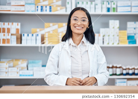 Pharmacy portrait, medicine pills and happy woman in drugs store, pharmaceutical shop or healthcare dispensary. Hospital retail manager, inventory stock product or medical pharmacist for help support 130692354
