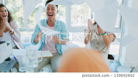 Throwing paper in the air, celebration and business people in a meeting, investment and happiness with cheering in a workplace. Staff, victory or manager with employees, applause and wow with a smile 130692602