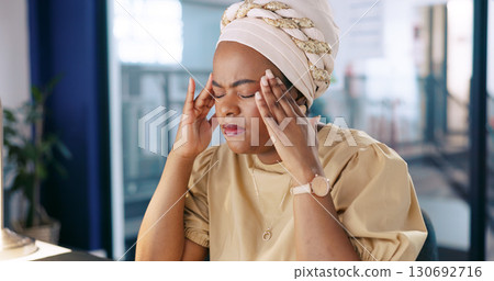 Headache, business woman and stress or tired employee overworked in an office. Working, burnout and anxiety of a african professional with hand on head feeling fatigue with pain, crisis or mistake 130692716