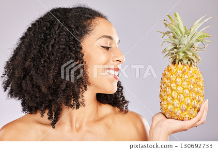 Pineapple, black woman smile and yellow tropical fruit for vitamin c diet and wellness. Isolated, studio background and nutrition for detox, weight loss and skin glow with healthy organic fruits Pineapple, black woman smile and yellow tropical fruit for vitamin c diet and wellness. Isolated, studio background and nutrition for detox, weight loss and skin glow with healthy organic fruits 130692733