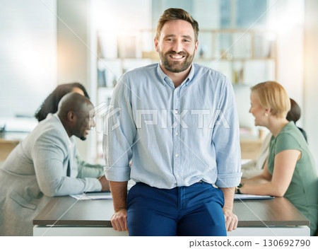 Leader, leadership and man startup founder happy with company strategy in a meeting with a positive mindset in a boardroom. Portrait, smile and business man confident, proud and excited for future 130692790