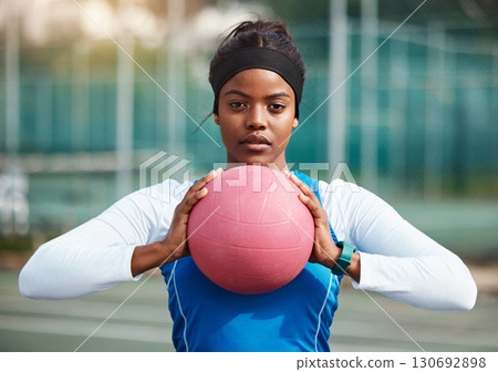 Portrait, serious black girl with netball and sports, fitness and training for game outdoor, confident teen and ready. Exercise, athlete and African female with ball, healthy and active lifestyle 130692898