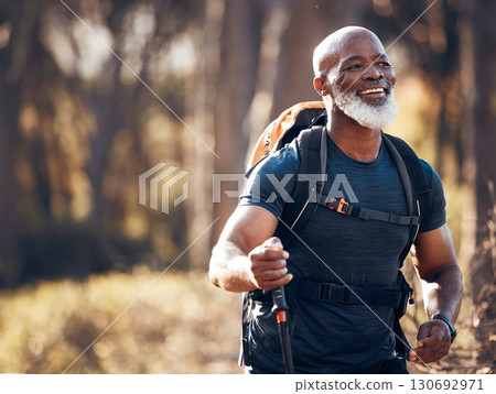 Fitness, hiking and smile with black man in forest for freedom, health and sports training. Exercise, peace and wellness with senior hiker trekking in nature for travel, summer break and adventure Fitness, hiking and smile with black man in forest for freedom, health and sports training. Exercise, peace and wellness with senior hiker trekking in nature for travel, summer break and adventure 130692971
