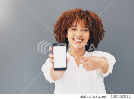 Mockup, blank phone screen and black woman hand pointing to digital advertisement and web message. Discount, sale and promotion deal mock up of a young female in a studio with gray background Mockup, blank phone screen and black woman hand pointing to digital advertisement and web message. Discount, sale and promotion deal mock up of a young female in a studio with gray background 130692982