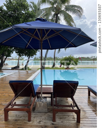 Maldives Paradise: Infinity Pool Overlooking Ocean and Beach Maldives Paradise: Infinity Pool Overlooking Ocean and Beach 130693887