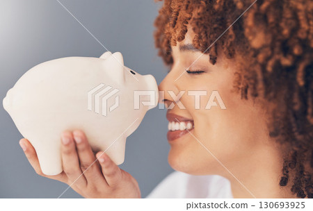 Smile, piggy bank or happy black woman with savings budget or financial profits growth on studio background. Face, finance or African girl holding tin container for cash loan or money investment Smile, piggy bank or happy black woman with savings budget or financial profits growth on studio background. Face, finance or African girl holding tin container for cash loan or money investment 130693925