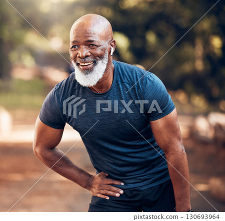 Running, break and black man breathing for fitness, exercise and workout in nature, park or garden. Senior male, sports and rest with smile, motivation and healthy cardio wellness outdoors with music Running, break and black man breathing for fitness, exercise and workout in nature, park or garden. Senior male, sports and rest with smile, motivation and healthy cardio wellness outdoors with music 130693964