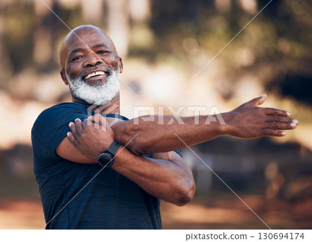 Black man, portrait and stretching for exercise outdoor in nature forest for fitness and healthy lifestyle. Senior person smile for workout, training and muscle warm up for cardio health and wellness Black man, portrait and stretching for exercise outdoor in nature forest for fitness and healthy lifestyle. Senior person smile for workout, training and muscle warm up for cardio health and wellness 130694174