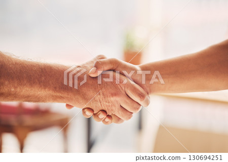 Handshake, partnership and agreement with solidarity and team, onboarding and recruitment with people. Shaking hands, trust and hiring with thank you or congratulations, collaboration with meeting 130694251