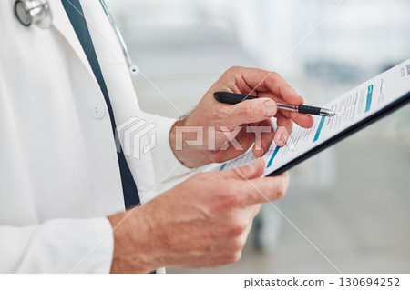 Doctor, reading or hands writing checklist for healthcare consulting, medical information or insurance detail. Nurse, medicine or worker on documents, wellness report planning or paper administration 130694252