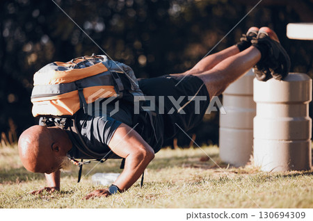 Pushup, training and black man at a fitness bootcamp for exercise, workout and sports. Strong, bodybuilder and athlete doing a cardio challenge, physical activity and strength routine on a field Pushup, training and black man at a fitness bootcamp for exercise, workout and sports. Strong, bodybuilder and athlete doing a cardio challenge, physical activity and strength routine on a field 130694309