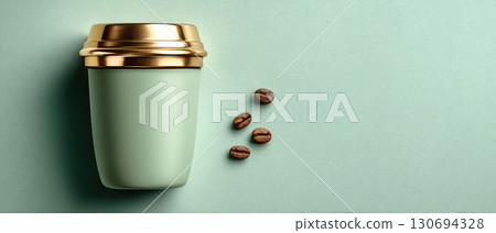 luxury reusable coffee cup with gold lid and beans 130694328