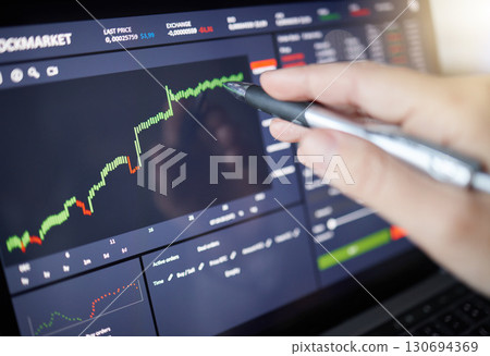 Hands, laptop and monitoring stock market chart or graph for trading, cryptocurrency or profit of investment. Hand of trader, investor or broker on computer checking candle stick increase to invest 130694369