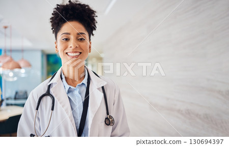Portrait of black woman doctor with smile, mockup and confidence, leader in African medicine and treatment. Happy medical professional, trust and help, professional healthcare consultant in hospital. 130694397