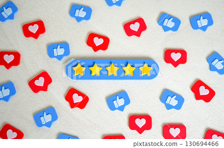 Five stars, likes and shares. Social validation, high ratings, or quality recognition. Customer review metrics in digital marketing. The highest level of recognition. 130694466