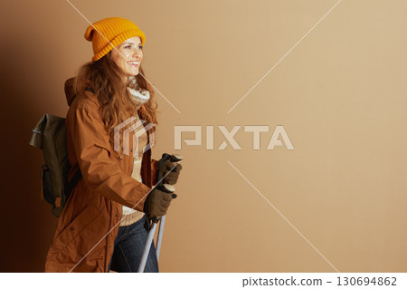 Smiling Hiker with Backpack and Hiking Poles Smiling Hiker with Backpack and Hiking Poles 130694862