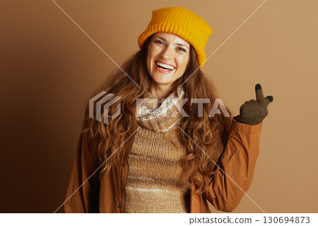 Playful Woman Crossing Fingers for Good Luck Playful Woman Crossing Fingers for Good Luck 130694873