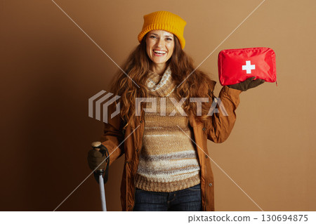 Winter Hiker Prepared with First Aid and Pole Winter Hiker Prepared with First Aid and Pole 130694875
