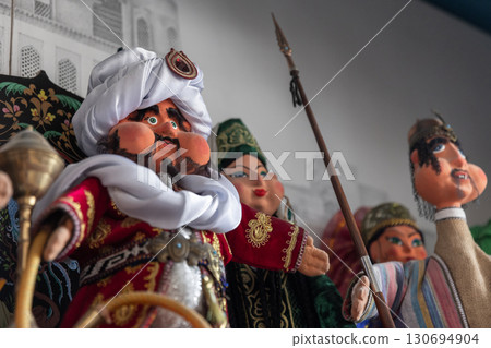 Handmade Uzbek hand puppets for sale. Assortment of tourist shop 130694904