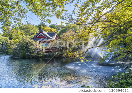Scenery of Inokashira Park and Inokashira Pond: Benzaiten surrounded by trees [Tokyo, Musashino City - Mitaka City] 130694911