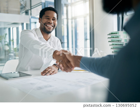 Black man, handshake and architecture with architect recruitment, job interview and onboarding, office and blueprint plan. Human resources, hiring and partnership with deal, contract and thank you 130695052