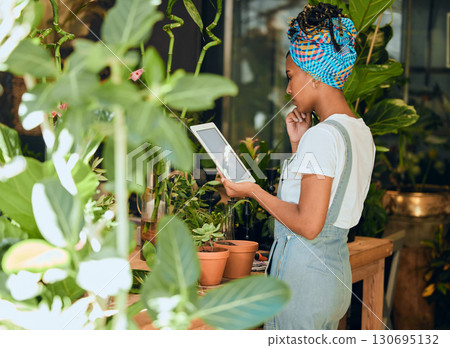 Tablet, small business or black woman with plants research for agriculture development or agro management. Digital app, store manager or entrepreneur working on quality floral sustainability online Tablet, small business or black woman with plants research for agriculture development or agro management. Digital app, store manager or entrepreneur working on quality floral sustainability online 130695132