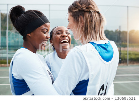 Hug, success or teamwork in netball training game or match with goals on sports court together. Group of winners, fitness friends or excited young athlete girls with happy smile to celebrate winning 130695521