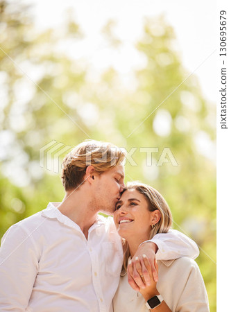Hug, love and couple kiss for happy, quality time and bonding on weekend, vacation and holiday. Summer, dating mockup and young man and woman hugging, kissing and romantic embrace in nature park Hug, love and couple kiss for happy, quality time and bonding on weekend, vacation and holiday. Summer, dating mockup and young man and woman hugging, kissing and romantic embrace in nature park 130695679