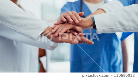 Doctor, teamwork and hands together in healthcare, meeting or collaboration for motivation at hospital. Closeup of medical group piling in team building, support or trust for staff goals at clinic 130696038