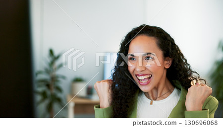 Business woman, fist and winning at computer in office for bonus, promotion and announcement of achievement. Happy employee, pride and celebrate deal, profit and success of online results at desktop 130696068
