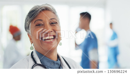 Portrait, doctor and happy woman with laughing in hospital for medical and healthcare work. Professional, job and African female worker smile in clinic ready for service and consulting on treatment Portrait, doctor and happy woman with laughing in hospital for medical and healthcare work. Professional, job and African female worker smile in clinic ready for service and consulting on treatment 130696224