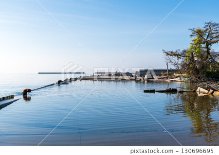 A view of Iida Port, where seawater is flooding the dike due to land subsidence A view of Iida Port, where seawater is flooding the dike due to land subsidence 130696695