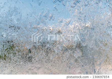 Aqua background. Product space next to clean water streams and water splashes and drops. Aqua background. Product space next to clean water streams and water splashes and drops. 130697854