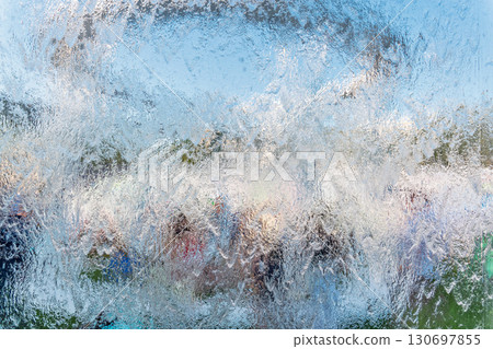 Aqua background. Product space next to clean water streams and water splashes and drops. Aqua background. Product space next to clean water streams and water splashes and drops. 130697855